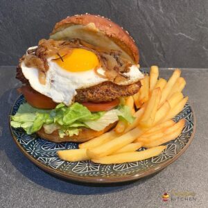 Burger poulet croustillant et oignons caramélisés