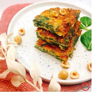 Quiche sans pâte épinard, chèvre et noisette