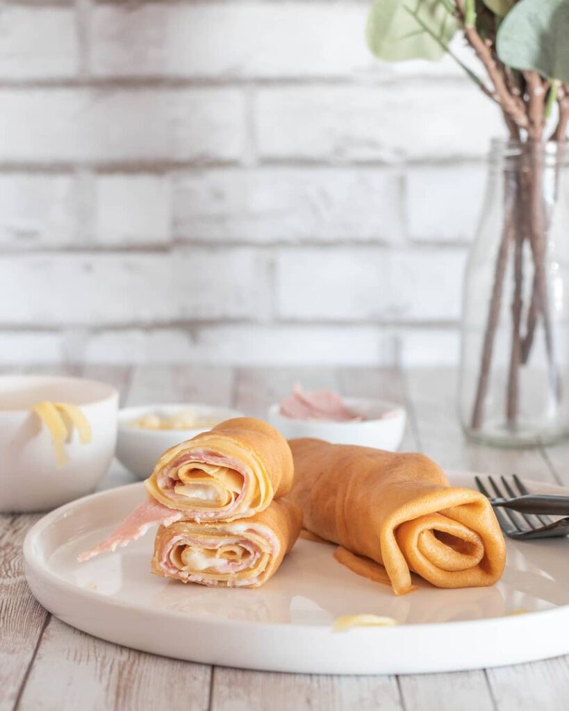 Crêpes roulées béchamel et jambon